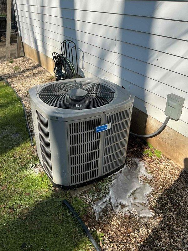 Completed comprehensive tune-up and cleaning service on two HVAC systems: one outdoor air conditioning condenser unit with cylindrical design and top-mounted fan assembly, and one heating system. Performed standard maintenance procedures including inspection of electrical connections and conduit, verification of proper airflow through vertical louver vents, assessment of unit mounting and clearances on concrete and gravel pads, and cleaning of both systems. Both units appeared to be approximately two years old and were found in good operating condition with no major issues identified during the service visit.