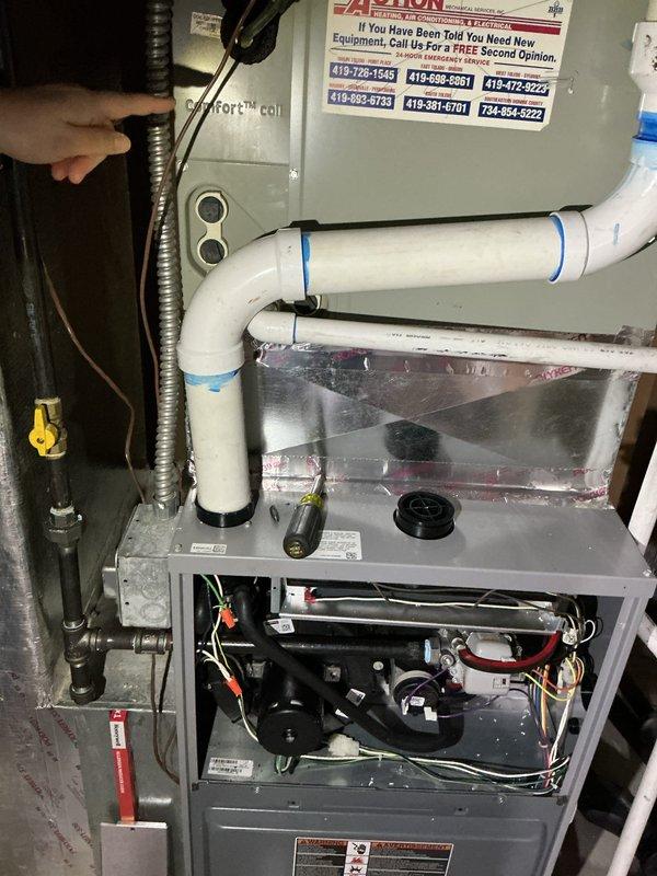 Completed comprehensive heating system tune-up and maintenance on residential forced-air furnace unit. Performed thorough inspection of all internal components including blower motor, electrical connections, and mechanical assemblies with access panel removed for detailed evaluation. Verified proper operation of all system components, checked condensate drainage piping, and documented equipment condition through photographic records for service history.