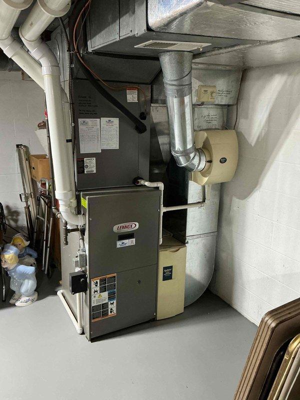 Completed maintenance visit on 17-year-old Lennox gas furnace system with Aprilaire humidifier. Performed comprehensive heating system inspection and documented equipment condition with photos. Advised customer that this represents the final visit under current maintenance agreement and recommended enrollment in renewal program given the age of the equipment.