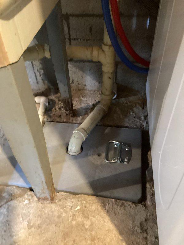 Returned to property to address installer damage from previous HVAC installation. Replaced cracked sewer cover in basement that was broken during initial equipment installation. Verified proper fit and seal of new cover, confirmed no drainage issues, and cleaned work area of debris.