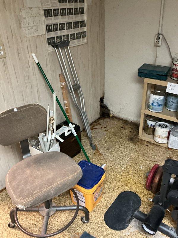Responded to callback for recent boiler installation with reported water leak from incoming supply line causing significant flooding in utility room. Upon arrival, found water supply shut off by homeowner. Inspected installation and identified leak at incoming water line connection to boiler, estimated at approximately half gallon per hour discharge rate. Documented water damage to flooring and wall surfaces in utility room with photographic evidence showing discoloration and moisture damage at floor-to-wall junction. Assessed leak source and prepared for necessary repairs to incoming line connection.