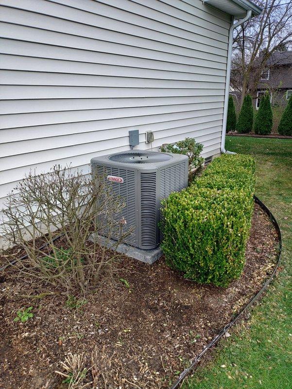 Completed full HVAC system installation including Lennox 14 SEER 2-ton single-stage condensing unit with downflow 96% efficiency 70k BTU split gas furnace per AHRI reference #215581723. Installed all-aluminum cased evaporator coil, metal reuse filter rack, and 17-gallon whole-home humidifier. Ran 3/4" x 30' refrigerant line set connecting indoor and outdoor units. Positioned condensing unit on new 36"x36" equipment pad with proper clearances and installed electrical disconnect with whip per code requirements. Mounted Lennox L-40 programmable thermostat and verified proper communication with system. Tested all system operations including heating, cooling, and humidification functions to confirm performance within manufacturer specifications. All equipment installed in compliance with local codes and manufacturer guidelines, system operational and ready for service.