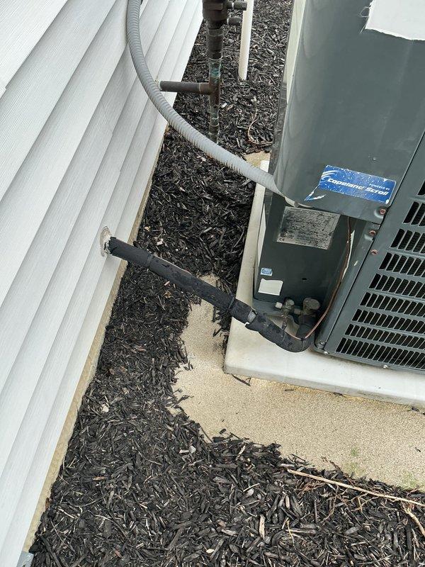 Completed comprehensive preventive maintenance tune-up on residential air conditioning system located on side of home. Unit is 10-20 years old and was thoroughly inspected, cleaned, and tested according to manufacturer specifications. Performed standard maintenance procedures including checking refrigerant levels, inspecting electrical connections, cleaning condenser coils, verifying proper airflow, and ensuring all components are operating within normal parameters for optimal cooling performance.