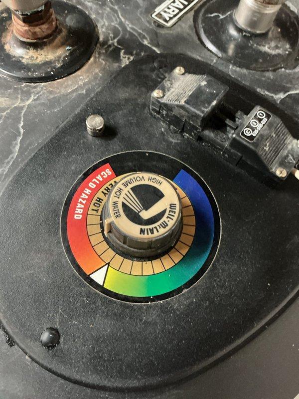 Responded to service call for reported leaking bleeder valve on heating system. Upon inspection, identified the issue was related to the pressure relief valve assembly on the water heater, not the furnace bleeder valve. Examined the temperature and pressure relief valve with sight glass component and associated plumbing connections. Assessed the copper piping, compression fittings, and valve assembly for signs of leakage or failure. Documented equipment condition including natural oxidation on copper lines and overall system configuration for service records.