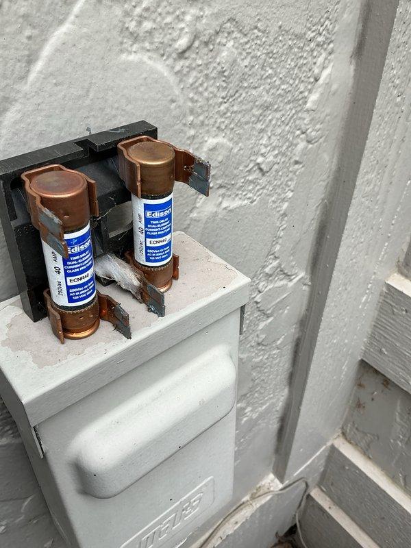 Completed scheduled cooling maintenance on 5-year-old air conditioning system. Performed comprehensive inspection of outdoor condensing unit, including examination of compressor, condenser coil, and electrical components. Observed significant accumulation of dirt, dust, and debris on condenser coil fins, which reduces heat transfer efficiency and system performance. Cleaned condenser coil thoroughly to restore optimal airflow and heat exchange capacity. Inspected electrical disconnect box and fuse assembly, confirming proper installation and secure connections. Verified all electrical wiring and conduit connections at outdoor unit. Checked refrigerant lines for signs of wear or damage. System operational and running efficiently following maintenance procedures. Customer renewed maintenance membership during service visit.
