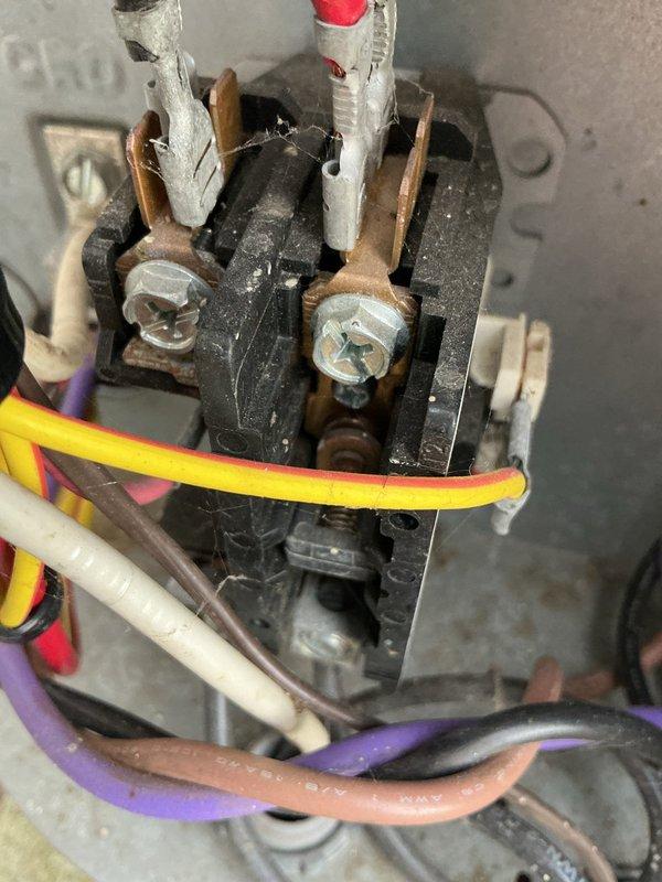 Completed preventative maintenance service on a 15-year-old air conditioning system. Performed comprehensive system inspection including examination of electrical components, contactor assembly, and humidity control equipment. Verified proper operation of GeneralAire digital humidity controller, which displayed 66% RH in manual mode. Inspected contactor relay assembly within electrical enclosure, noting multiple wire connections in good working condition despite age of system. Checked all electrical connections, copper refrigerant lines, and mounting hardware for security and proper installation. System operational upon completion of service visit.