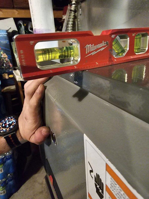 Completed furnace installation with proper leveling and alignment of the new unit. Verified equipment was positioned correctly using precision leveling tools to ensure optimal performance and compliance with manufacturer specifications. Unit secured and labeled with all required safety warnings in place.