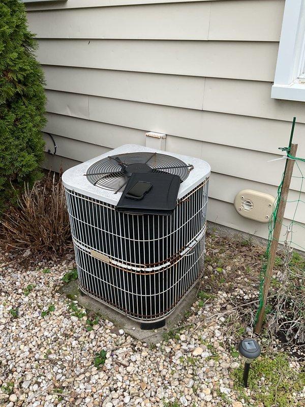 Completed comprehensive full system replacement estimate for residential HVAC system. Evaluated existing indoor air handler unit located in mechanical room with current PVC condensate drainage configuration and ductwork connections, as well as outdoor condenser unit positioned on concrete pad with gravel surround against home exterior. Documented equipment specifications, current installation conditions, and provided detailed replacement recommendations for complete heating and cooling system upgrade.