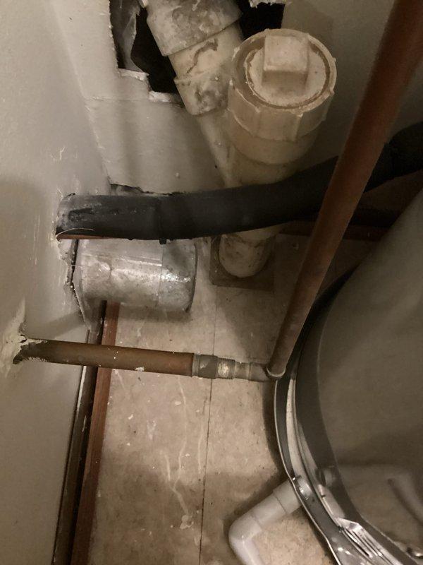 Responded to pre-sale home inspection concerns regarding plumbing installations. Inspected and addressed flue vent configuration on water heater to ensure compliance with code requirements and provided technical documentation explaining proper installation methodology. Installed sediment trap (drip leg) on gas line serving dryer appliance to meet current safety standards and inspection requirements for property transfer.
