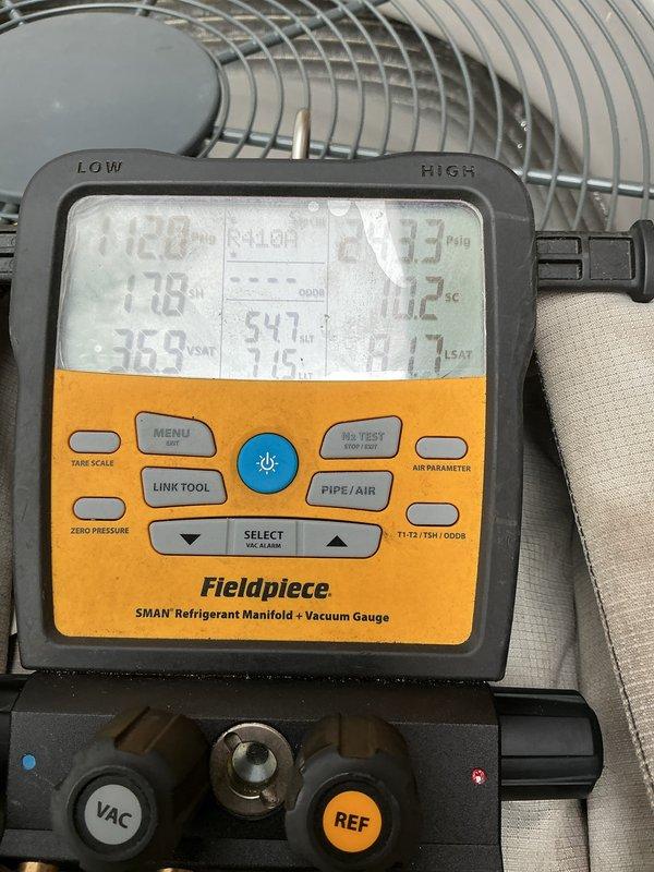 Performed routine air conditioning maintenance and system diagnostics. Utilized refrigerant manifold gauge set to measure system pressures and temperatures, recording readings of 170°F and 36.8°F with 54.7 PSI pressure. Inspected electrical components including contactor relay, verified proper wire connections and terminal integrity across all conductor points. System operating within normal parameters upon completion of maintenance inspection.