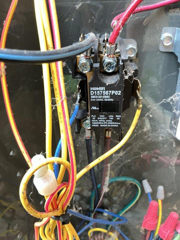 Performed routine air conditioning maintenance and system diagnostics. Utilized refrigerant manifold gauge set to measure system pressures and temperatures, recording readings of 170°F and 36.8°F with 54.7 PSI pressure. Inspected electrical components including contactor relay, verified proper wire connections and terminal integrity across all conductor points. System operating within normal parameters upon completion of maintenance inspection.