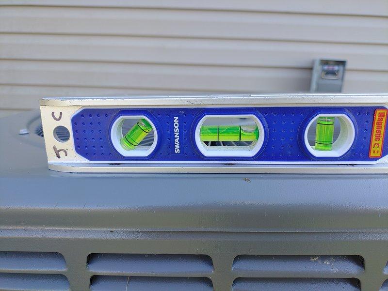 Completed comprehensive maintenance tune-up on 5-year-old outdoor air conditioning condenser unit. Performed standard preventive maintenance procedures including inspection of all mechanical and electrical components, verified proper refrigerant levels, checked unit levelness, cleaned condenser coils, and confirmed all safety controls and indicator lights functioning correctly. Unit operating within normal parameters with no deficiencies noted.