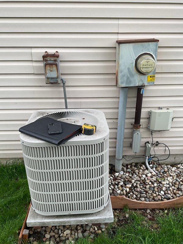 Conducted comprehensive assessment of existing HVAC system including outdoor air conditioning condenser unit and basement furnace installation. Evaluated current equipment condition, measured existing unit specifications, documented electrical service configuration including meter assembly and disconnect box, and assessed ductwork infrastructure. Provided detailed replacement estimate for complete furnace and AC system upgrade with equipment sizing recommendations based on home's heating and cooling requirements.