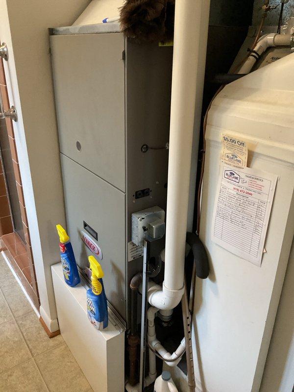 Conducted comprehensive assessment of existing HVAC system located in residential utility closet for air conditioning replacement estimate. Evaluated current equipment configuration including furnace unit and adjacent water heater to determine spatial requirements and compatibility for new AC installation. Documented existing mechanical room layout, clearance specifications, and access points necessary for equipment removal and replacement. Assessed electrical service capacity, refrigerant line routing, condensate drain provisions, and ventilation requirements to provide accurate replacement specifications and installation scope.