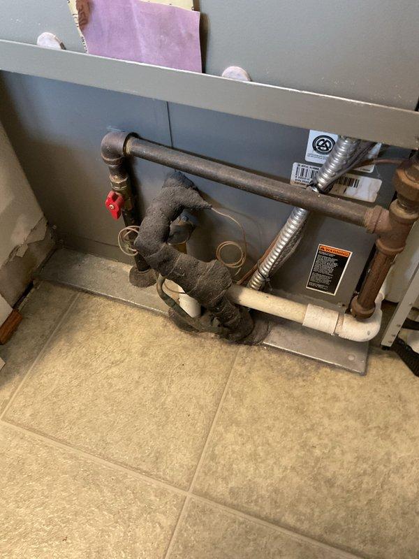 Conducted comprehensive assessment of existing HVAC system located in residential utility closet for air conditioning replacement estimate. Evaluated current equipment configuration including furnace unit and adjacent water heater to determine spatial requirements and compatibility for new AC installation. Documented existing mechanical room layout, clearance specifications, and access points necessary for equipment removal and replacement. Assessed electrical service capacity, refrigerant line routing, condensate drain provisions, and ventilation requirements to provide accurate replacement specifications and installation scope.