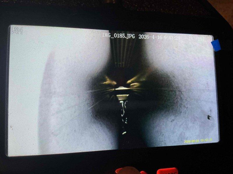 Completed comprehensive AC tune-up on 20-year-old outdoor cooling unit. Performed standard maintenance protocol including inspection of ductwork and flexible connections, verified system operation, and documented equipment condition with interior duct camera inspection showing corrugated transition ductwork and ventilation pathways. Unit operational and ready for cooling season.