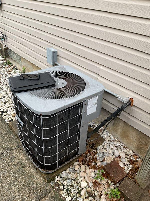 Completed comprehensive estimate for full HVAC system replacement including outdoor condensing unit and indoor furnace/air handler assembly. Outdoor unit shows significant age with weathered concrete pad and deteriorating conditions, while indoor Bryant furnace and air handler exhibit visible wear, rust, and moisture damage around plenum connections. Provided detailed equipment specifications and replacement recommendations for complete system upgrade to restore efficient heating and cooling operation.