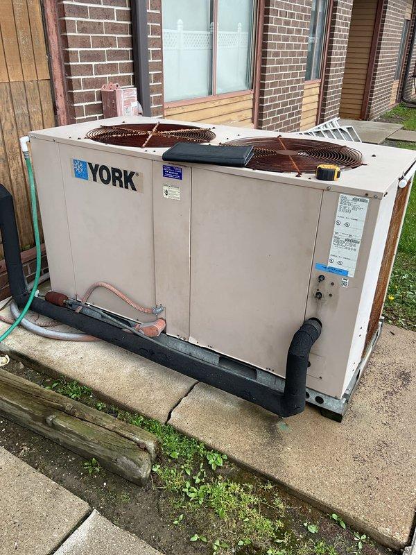 Completed comprehensive estimate for replacement of existing 10-ton split system HVAC unit with 14 SEER equipment. Inspected current York condenser unit and interior air handler, documenting significant deterioration of internal insulation material and overall system wear. Provided detailed assessment and replacement recommendations for complete system upgrade.