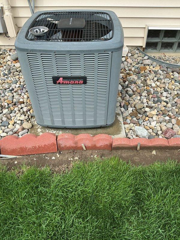 Completed preventive maintenance on 14-year-old Amana air conditioning system during scheduled service window. Performed comprehensive inspection of outdoor condenser unit, noting significant corrosion and deterioration on electrical contactor assembly with visible rust on metal components and terminals. System operational at time of service, though electrical components show age-related wear consistent with unit's service life.