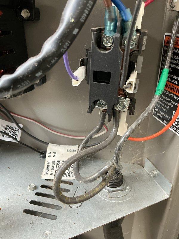 Completed annual maintenance on 1-year-old air conditioning system. Performed comprehensive tune-up including inspection of electrical connections at terminal block, verified proper wire terminations and checked for heat damage on conductors. Inspected condensate drain assembly and flexible drain line connections to ensure proper drainage function.