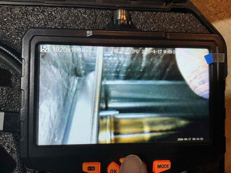 Completed preventative maintenance on a 15-year-old residential cooling system. Performed thorough inspection of evaporator coil and internal components using digital borescope camera to assess coil cleanliness and identify potential issues within the air handler. Verified system operational status and documented equipment condition through photographic evidence for maintenance records.
