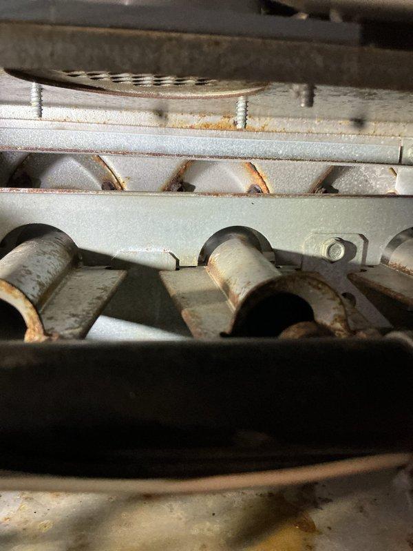 Completed initial heating and cooling maintenance visit on 17-year-old HVAC system. Performed comprehensive inspection of furnace burner assembly, noting oxidation present on burner tubes and heat exchanger components consistent with system age. Conducted flue gas analysis using combustion analyzer, measuring stack temperature at 103.4°F, oxygen level at 8.9%, carbon monoxide at 6 ppm, and combustion efficiency at 93.4%. System operating within acceptable parameters. Renewed maintenance agreement during visit.