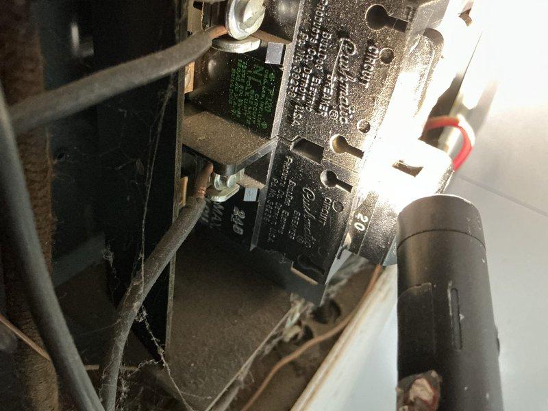 Responded to no cooling call and performed diagnostic evaluation of air conditioning system. Upon inspection, accessed electrical panel and HVAC control components to assess system functionality. Examined electrical contactors, relays, and associated wiring connections within the unit. Documented existing conditions including dust accumulation on electrical components and mounting brackets. Verified circuit breaker panel connections and traced power supply to cooling equipment to identify potential causes of system failure.