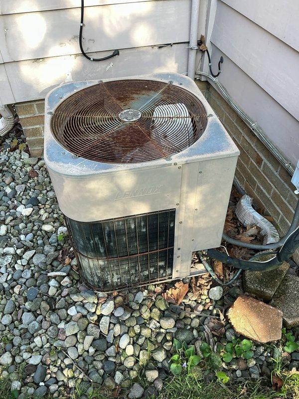 Completed scheduled preventive maintenance on residential air conditioning system. Inspected outdoor condenser unit, verified proper operation of compressor and condenser fan motor, checked refrigerant levels and electrical connections, and cleaned debris from unit exterior. System operating within normal parameters upon completion of maintenance visit.