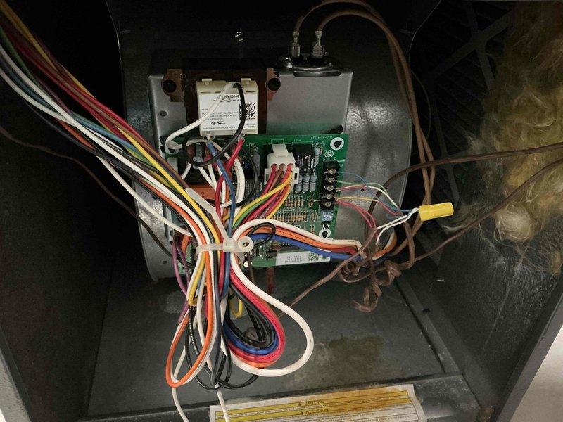 Completed comprehensive HVAC maintenance service including air conditioning system inspection and furnace evaluation. Replaced Skuttle humidifier evaporator pad (part number A04-1725-052) as requested by customer. Inspected control board, wiring connections, and relay components within furnace unit, verified proper humidifier operation with copper supply line connections, and documented equipment condition with photos for service records.