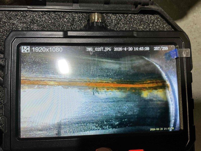 Completed spring maintenance on aging air conditioning system over 25 years old. Performed thorough inspection of heat exchanger coils using borescope camera, revealing mineral deposits and surface oxidation on internal components. System assessed for continued operation with recommendations provided for monitoring performance given age of equipment.
