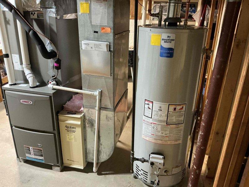 Completed comprehensive preventive maintenance on Lennox HVAC system, performing full A/C tune-up and furnace tune-up. Inspected all system components including refrigerant lines, condensate drainage, ductwork connections, and electrical systems. Confirmed furnace filter had been recently replaced by homeowner and did not require replacement at this time.