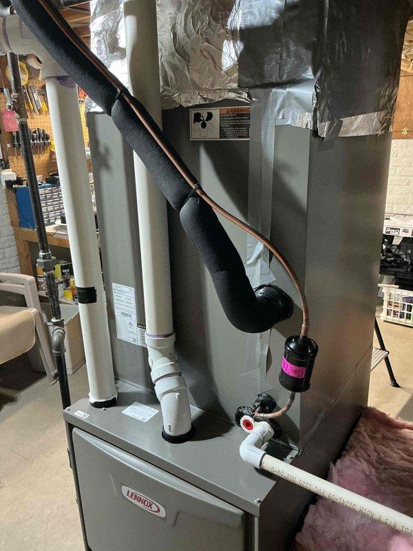 Completed comprehensive preventive maintenance on Lennox HVAC system, performing full A/C tune-up and furnace tune-up. Inspected all system components including refrigerant lines, condensate drainage, ductwork connections, and electrical systems. Confirmed furnace filter had been recently replaced by homeowner and did not require replacement at this time.