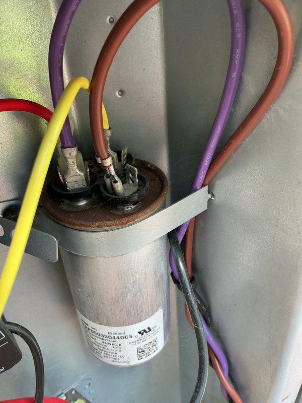Completed comprehensive air conditioning tune-up service including full system inspection and performance evaluation. Inspected electrical components including contactor assembly and run capacitor, verified proper wire connections and terminal integrity, and confirmed all electrical connections were secure with no signs of overheating or degradation. All system components found operating within normal parameters.