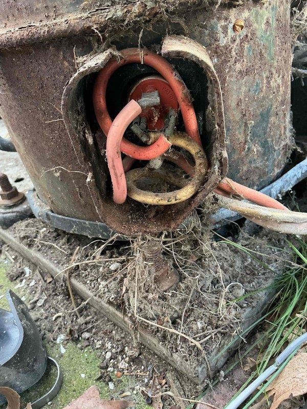 Responded to no cooling complaint on 30-year-old air conditioning unit. Upon arrival, found outdoor condensing unit with severe weathering, extensive rust damage, and corroded electrical components. Customer reported clicking sound prior to shutdown and stated unit had been operated without proper fuse protection. Inspection revealed deteriorated wiring connections with exposed conductors in electrical junction box, significant corrosion throughout contactor housing, and accumulated debris restricting airflow around base of unit. Due to age of equipment, extent of electrical degradation, and safety concerns from compromised wiring, recommended system replacement rather than repair. Unit deemed unsafe for continued operation and advised customer to discontinue use until replacement could be scheduled.