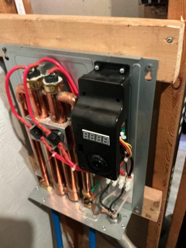 Responded to service call for EcoSmart tankless water heater that had stopped heating. Upon inspection, diagnosed and resolved the issue with the natural gas-fired unit, restoring full hot water functionality. Unit tested and verified operational with proper temperature output and all control systems functioning correctly.