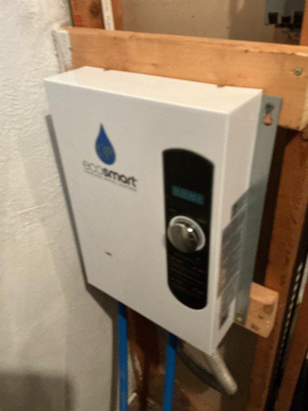 Responded to service call for EcoSmart tankless water heater that had stopped heating. Upon inspection, diagnosed and resolved the issue with the natural gas-fired unit, restoring full hot water functionality. Unit tested and verified operational with proper temperature output and all control systems functioning correctly.
