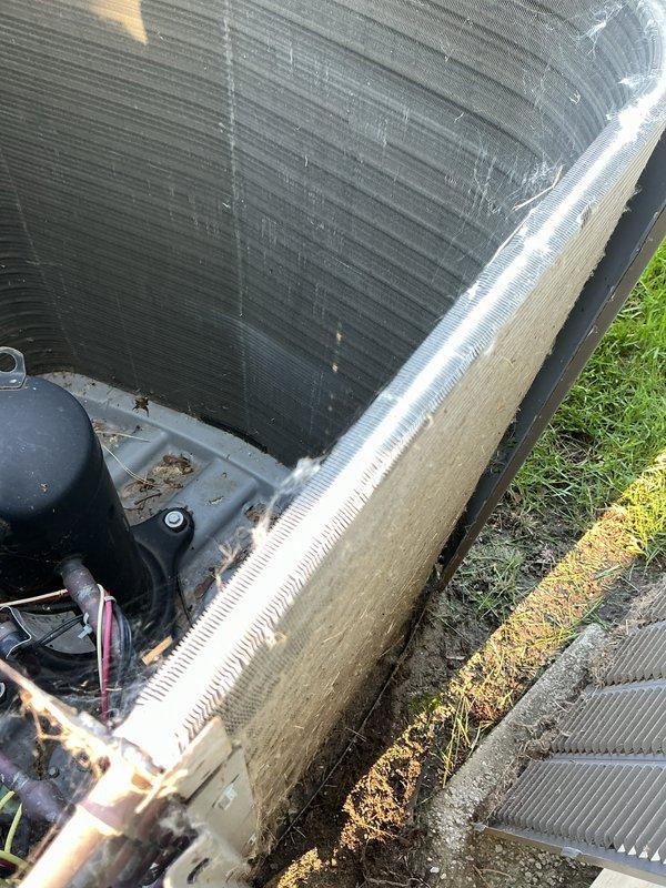 Performed scheduled maintenance on a 20-year-old residential air conditioning system. Conducted comprehensive electrical diagnostics using multimeter to test capacitor functionality (30/5 MFD, 440V rated) and verified proper voltage and amperage across all electrical components. Inspected condenser coil fins, which showed adequate moisture indicating active refrigerant cycle operation, and confirmed unit structural integrity with minimal debris accumulation on outdoor equipment.