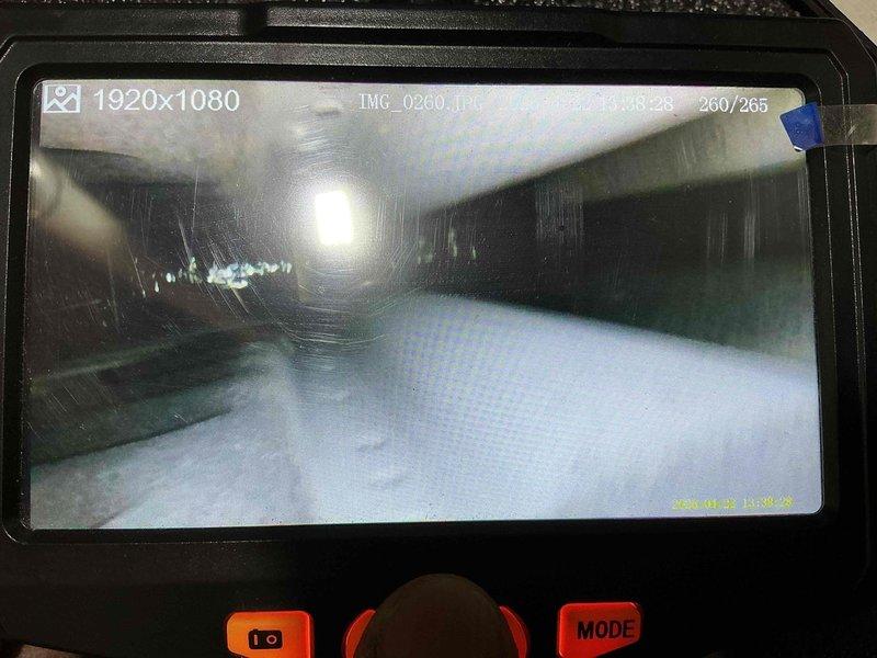 Performed comprehensive AC tune-up on 6-year-old outdoor unit located in yard alongside residence. Conducted thorough inspection of evaporator coil and internal ductwork using borescope camera, confirming coil fins and interior surfaces were clean with no significant debris accumulation or blockages detected. System operational and ready for cooling season.