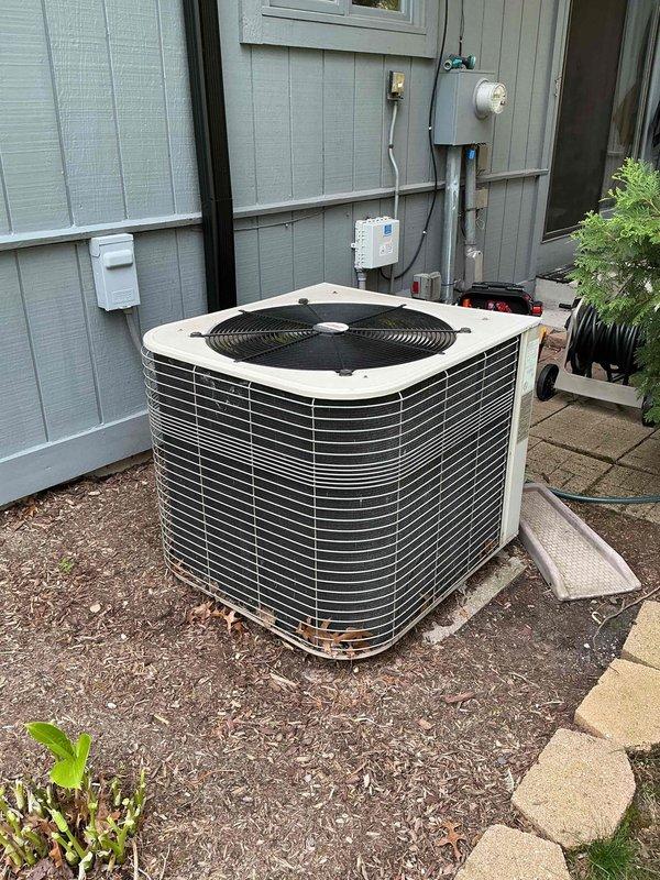 Completed maintenance visit on 22-year-old residential air conditioning system. Performed comprehensive preventive maintenance procedures including inspection of outdoor condenser unit, compressor assembly, refrigerant lines, and electrical connections. All components evaluated for proper operation and system performance verified satisfactory for continued cooling season operation.