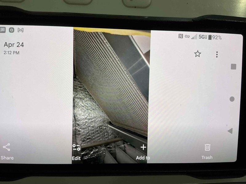 Responded to callback for refrigerant leak on equipment under one-year labor warranty. Performed comprehensive electronic leak search on system that had previously received 6 pounds of refrigerant without leak resolution. Inspected all refrigerant lines, connections, and ductwork in attic space using leak detection equipment. Documented system conditions with photographs showing flexible ductwork, insulation, and refrigerant line routing for warranty records. Located and addressed refrigerant leak to resolve ongoing system charge loss issue.