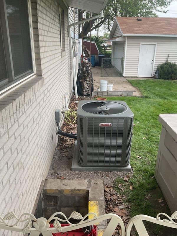 Completed full HVAC system installation including a 14 SEER Lennox condensing unit positioned on a new concrete pad in the backyard, with new disconnect and whip installed for proper electrical service. In the crawl space, installed a cased horizontal coil configuration with metal ductwork, ran new 3/8" x 3/4" x 30' copper line set connecting the indoor and outdoor components, and installed a Honeywell thermostat for system control.