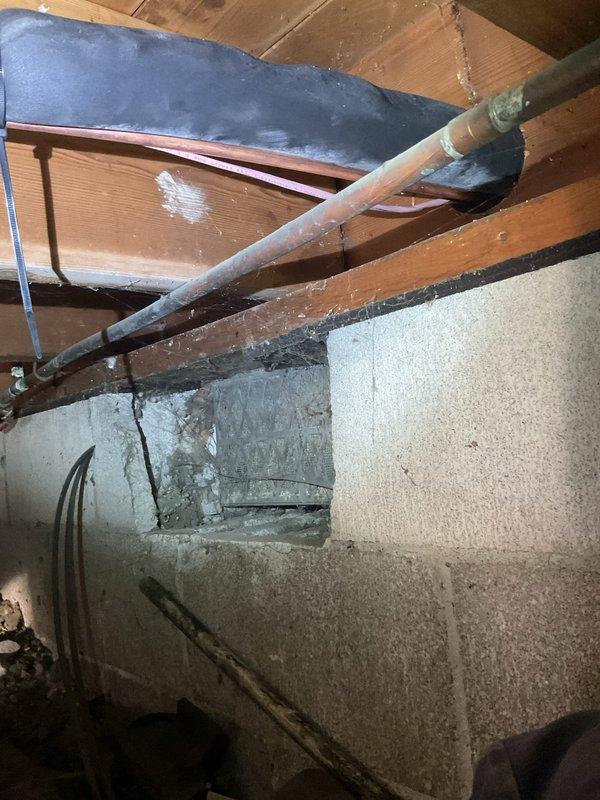 Completed full HVAC system installation including a 14 SEER Lennox condensing unit positioned on a new concrete pad in the backyard, with new disconnect and whip installed for proper electrical service. In the crawl space, installed a cased horizontal coil configuration with metal ductwork, ran new 3/8" x 3/4" x 30' copper line set connecting the indoor and outdoor components, and installed a Honeywell thermostat for system control.