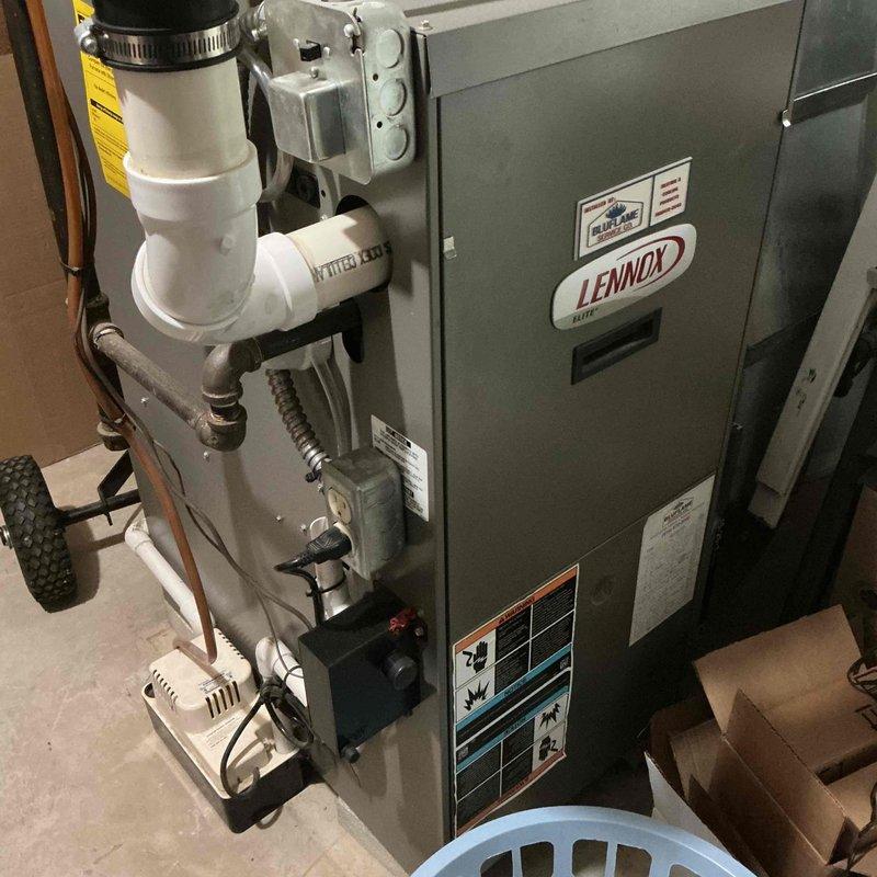 Completed scheduled cooling system maintenance on Lennox Elite Series system. Performed comprehensive inspection of outdoor condenser unit and indoor furnace components, verified proper operation of all equipment, documented system condition with photographs, and confirmed unit is functioning within normal parameters for continued reliable cooling performance.