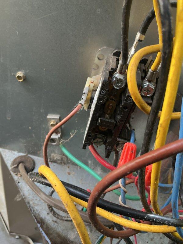 Completed scheduled preventive maintenance on residential cooling system approximately 2-3 years old. Performed comprehensive inspection of outdoor condenser unit, including examination of condenser coils, electrical connections, and terminal block. Documented equipment condition showing normal weathering and minor debris accumulation on coil fins. Verified electrical connections at contactor and terminal points were secure, with all color-coded conductors properly terminated. Unit operational and functioning within normal parameters.