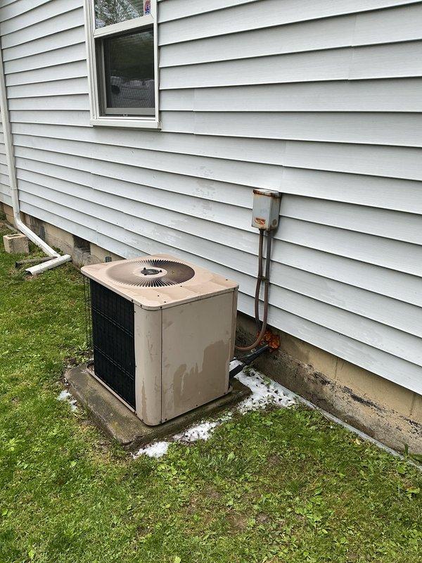 Performed comprehensive seasonal tune-up and maintenance inspection on 23-year-old residential air conditioning system. Evaluated outdoor condenser unit operation, checked refrigerant lines and connections, inspected indoor air handler components, and verified system functionality to ensure optimal cooling performance for the upcoming season.