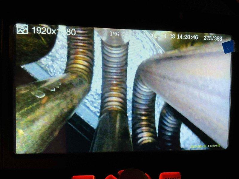 Completed comprehensive spring maintenance on 9-year-old air conditioning system. Performed standard preventive maintenance procedures including system inspection, cleaning, and performance verification. Documentation photos captured internal components showing normal wear patterns and metallic connections with minor surface oxidation consistent with system age.