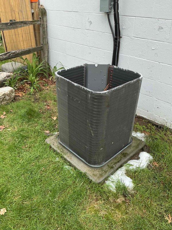 Responded to service call for 4-year-old air conditioning system that was not working and had frozen up prior to customer turning unit off at breaker on Saturday. Upon arrival, inspected outdoor condenser unit and internal components including capacitor and contactor. System had been off for sufficient time to allow ice to melt, enabling proper diagnostic evaluation of equipment and electrical connections to determine cause of freeze-up condition.