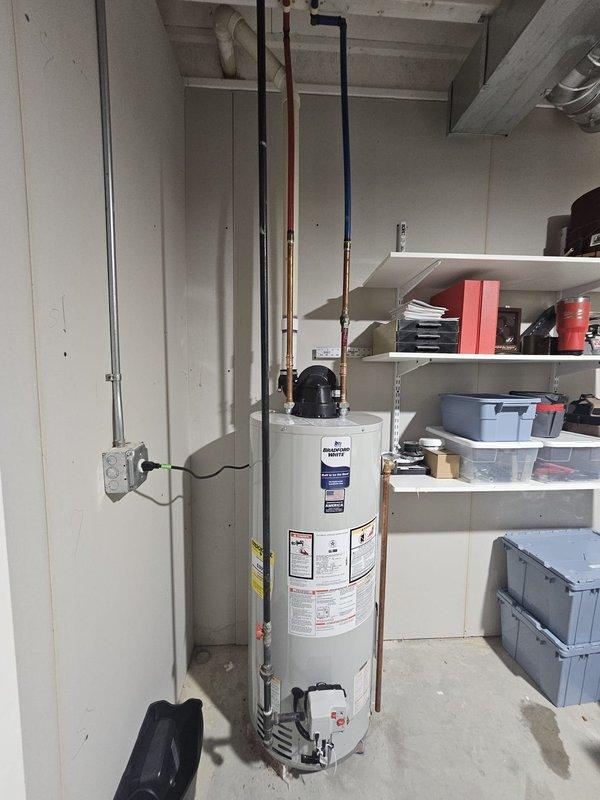 Completed full HVAC system installation including upflow 96% efficiency furnace with upflow cased evaporator coil, certified under AHRI #216049124. Replaced approximately 30 feet of venting below ceiling to accommodate high-efficiency condensing furnace requirements, and installed new 3/4-inch refrigerant line set running 50 feet through finished ceiling space to connect outdoor condensing unit. System commissioned, tested for proper operation, and verified all safety controls functioning within manufacturer specifications.