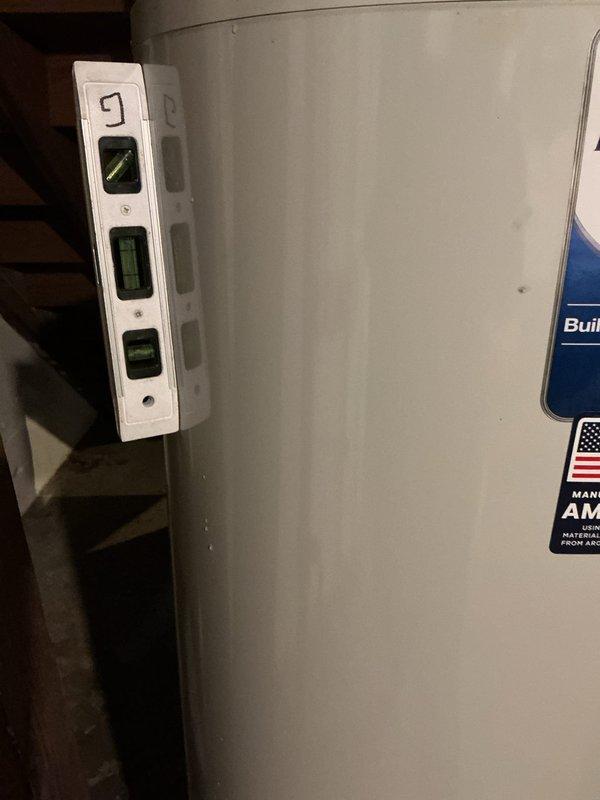 Completed installation of a 40-gallon natural draft water heater in basement utility area. Removed existing unit and installed new Bradford White CR50H6B3N model with 50,000 BTU/H input rating, manufactured for natural gas fuel type. Replaced gate valve on cold water supply line to ensure proper shutoff capability and code compliance. Verified all gas connections for proper sealing and tested for leaks using approved methods. Confirmed proper venting configuration for natural draft operation and adequate combustion air supply. Set temperature controls to manufacturer specifications and cycled unit through initial startup sequence. Tested temperature and pressure relief valve for proper operation and verified discharge piping meets safety requirements. Inspected all water connections at inlet and outlet ports for secure fittings without leaks. Confirmed unit is level and properly supported on stable surface. Verified clearances meet manufacturer requirements for safe operation and futur