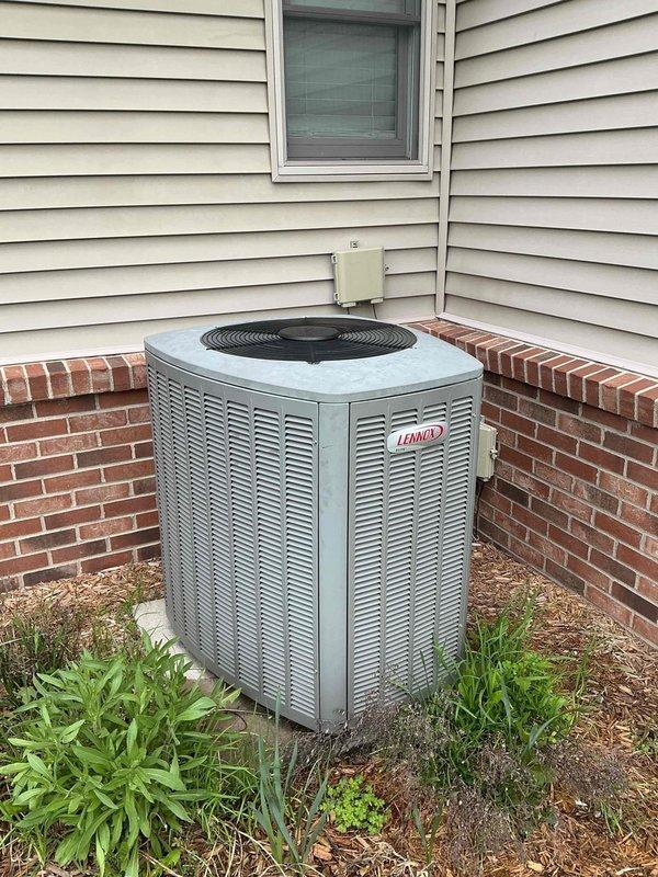 Completed comprehensive preventative maintenance tune-up on aging Lennox outdoor condensing unit located in backyard. System is over 10 years old and showing typical signs of wear including oxidized copper refrigerant lines, deteriorated cabinet interior coating, and weathered components. Performed standard maintenance protocol including inspection of evaporator coil assembly, heat exchanger, copper tubing connections, brass fittings and valves, electrical connections, and condenser unit exterior components. Verified proper operation of all mechanical and electrical systems, checked refrigerant line integrity, and confirmed unit functionality.